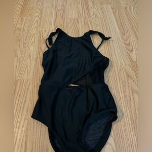 Five black leotard. Girls size large.